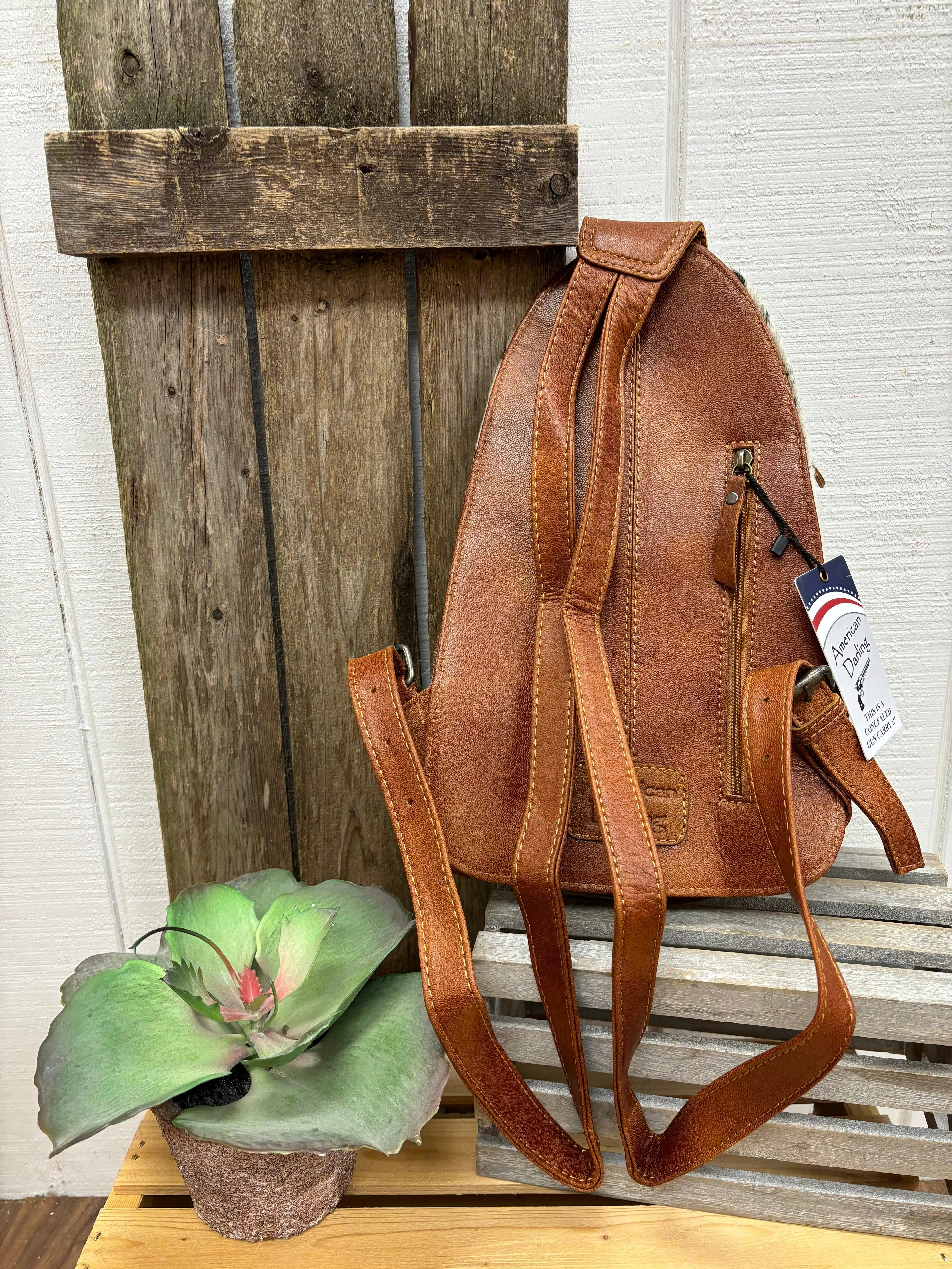 American Darling Genuine Tooled Leather Cowhide Hair-On Conceal Carry Sling Backpack ADBG1521