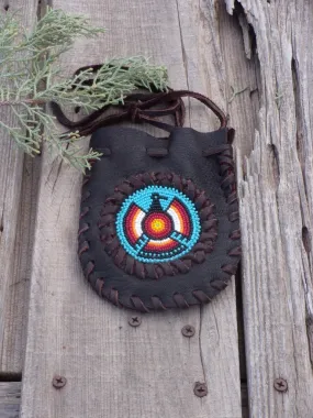 Amulet bag with beaded Thunderbird, necklace bag , leather medicine pouch