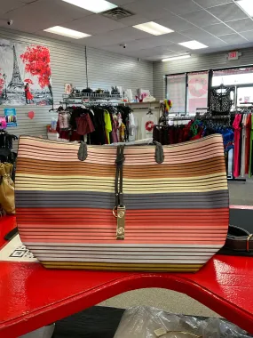 Neutral multi color purse inside a purse